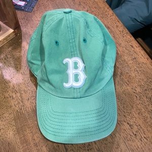 Green Boston Red Sox hat with shamrock